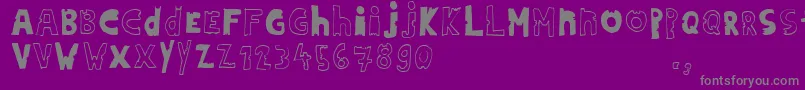 Hdontrial-fontti – harmaat kirjasimet violetilla taustalla