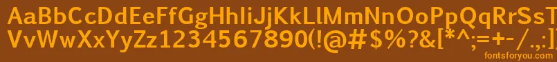 Czcionka PigiarniqBold – pomarańczowe czcionki na brązowym tle