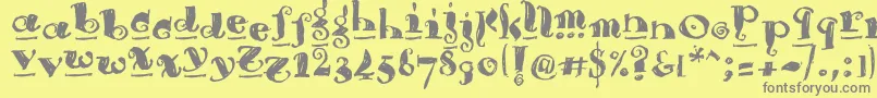 フォントBrouss – 黄色の背景に灰色の文字