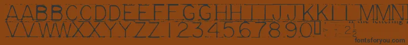 Mechf Font – Black Fonts on Brown Background