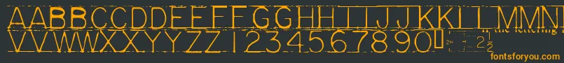 Mechf Font – Orange Fonts on Black Background