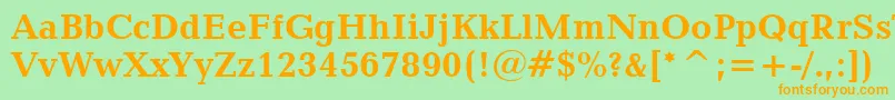 フォントCandidaBoldBt – オレンジの文字が緑の背景にあります。