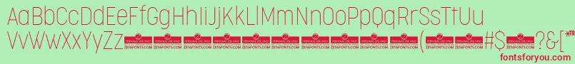 CocogooseCondensedThinTrial Font – Red Fonts on Green Background