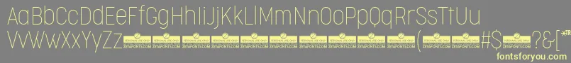 CocogooseCondensedThinTrial Font – Yellow Fonts on Gray Background