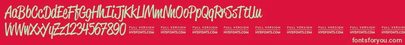 ReklamescriptRegularDemo Font – Green Fonts on Red Background