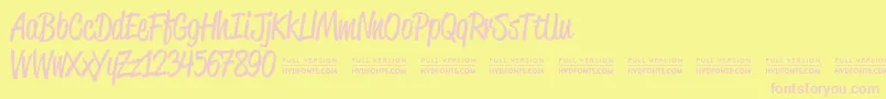 ReklamescriptRegularDemo Font – Pink Fonts on Yellow Background