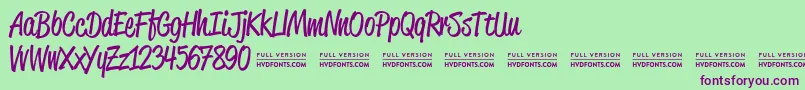 ReklamescriptRegularDemo Font – Purple Fonts on Green Background