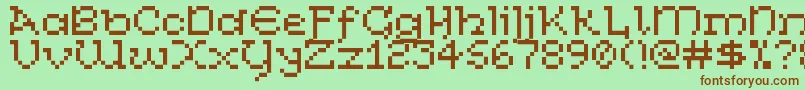 CelticBitty Font – Brown Fonts on Green Background