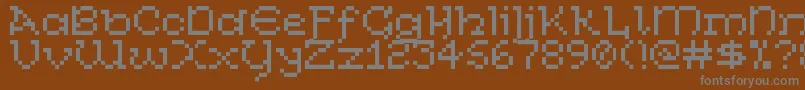 CelticBitty Font – Gray Fonts on Brown Background