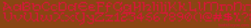 フォントCelticBitty – 赤い文字が茶色の背景にあります。