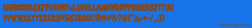 フォントMysticSinglerCondensed – 茶色の文字が青い背景にあります。