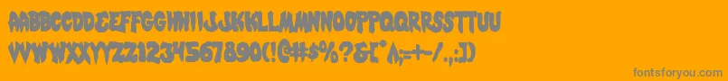 MysticSinglerCondensed-Schriftart – Graue Schriften auf orangefarbenem Hintergrund