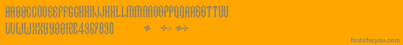 TwoFingersKingLight-Schriftart – Graue Schriften auf orangefarbenem Hintergrund