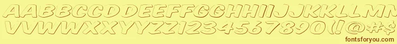 Komtitg Font – Brown Fonts on Yellow Background