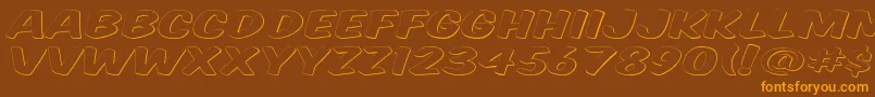 フォントKomtitg – オレンジ色の文字が茶色の背景にあります。