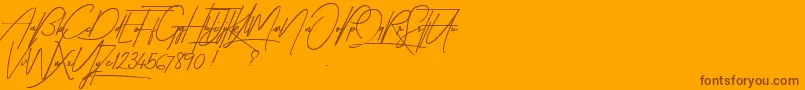 TakenByVulturesDemo-Schriftart – Braune Schriften auf orangefarbenem Hintergrund