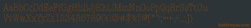 Шрифт AmtypewritercditcttLight – коричневые шрифты на чёрном фоне