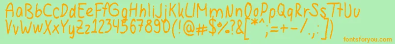 Hannahandwriting Font – Orange Fonts on Green Background
