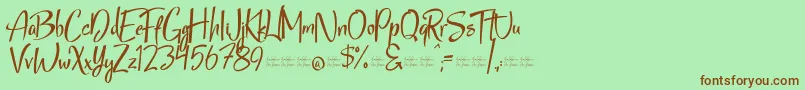 StarmixFree Font – Brown Fonts on Green Background