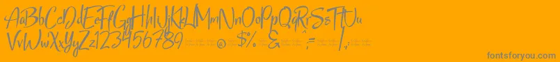 StarmixFree-Schriftart – Graue Schriften auf orangefarbenem Hintergrund