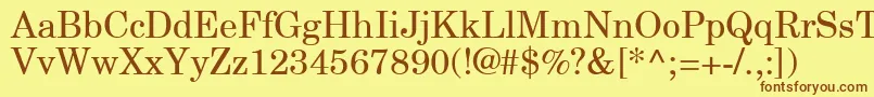 NewCenturySchlbkGreekUpright-Schriftart – Braune Schriften auf gelbem Hintergrund