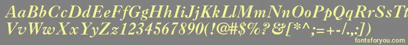 Caslon3ltstdItalic-fontti – keltaiset fontit harmaalla taustalla