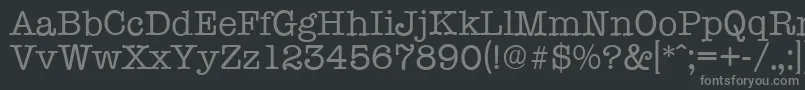 フォントTypewriterserialRegular – 黒い背景に灰色の文字