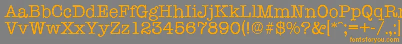 Шрифт TypewriterserialRegular – оранжевые шрифты на сером фоне