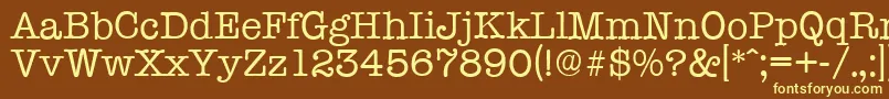 TypewriterserialRegular-fontti – keltaiset fontit ruskealla taustalla
