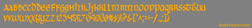 フォントCryv2c – オレンジの文字は灰色の背景にあります。