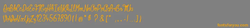 Kilowatts Font – Orange Fonts on Gray Background