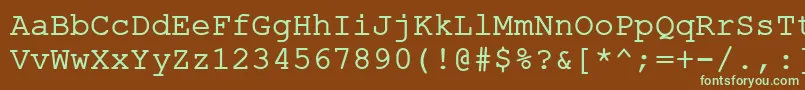 フォントErKurierKoi8Normal – 緑色の文字が茶色の背景にあります。