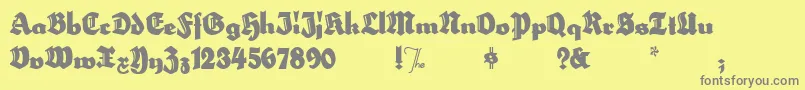 Fonte HerzogvongrafTallMeg – fontes cinzas em um fundo amarelo