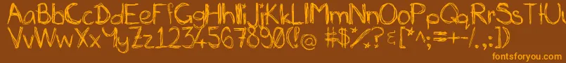 フォントMiasscribblings – オレンジ色の文字が茶色の背景にあります。