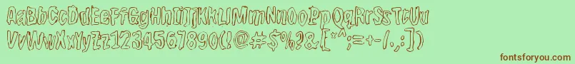 Bwherogreezero Font – Brown Fonts on Green Background