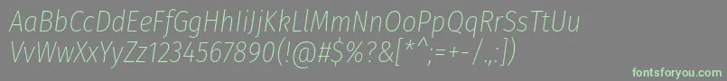 FirasanscondensedUltralightitalic-Schriftart – Grüne Schriften auf grauem Hintergrund