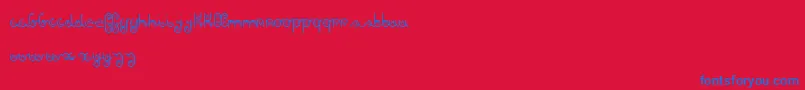 AgainDker Font – Blue Fonts on Red Background