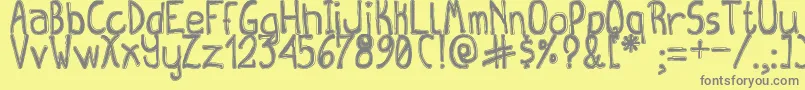 QueenDestroyTfb Font – Gray Fonts on Yellow Background