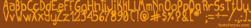 QueenDestroyTfb Font – Orange Fonts on Brown Background