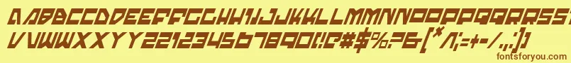 フォントTrajiaci – 茶色の文字が黄色の背景にあります。