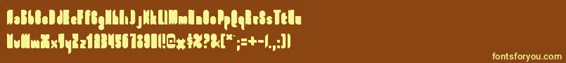 FullFont-fontti – keltaiset fontit ruskealla taustalla