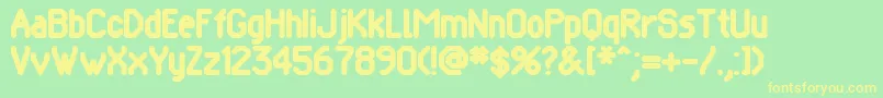 Pomcrg Font – Yellow Fonts on Green Background