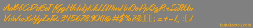 Queenata-Schriftart – Orangefarbene Schriften auf grauem Hintergrund