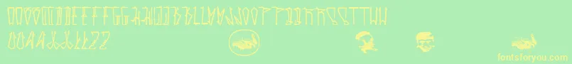 Estaktu Font – Yellow Fonts on Green Background