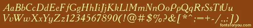 Academyi-fontti – keltaiset fontit ruskealla taustalla