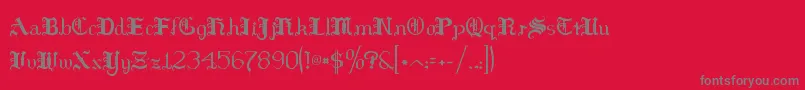 フォントHildaSonnenschein – 赤い背景に灰色の文字