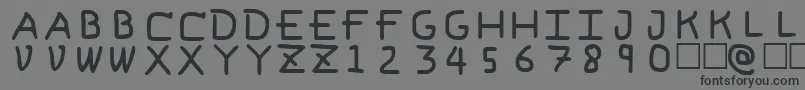 フォントPfVeryverybadfont6 – 黒い文字の灰色の背景