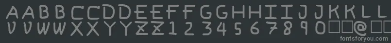 PfVeryverybadfont6-fontti – harmaat kirjasimet mustalla taustalla