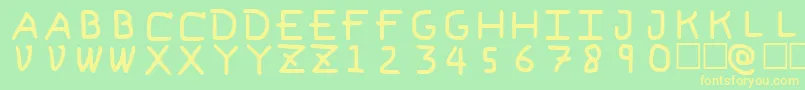 フォントPfVeryverybadfont6 – 黄色の文字が緑の背景にあります