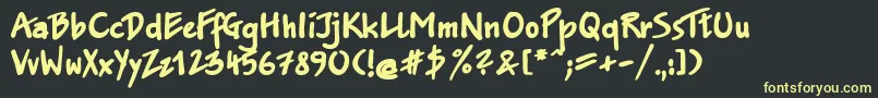 フォントSanasoftJakobExtra.Kz – 黒い背景に黄色の文字
